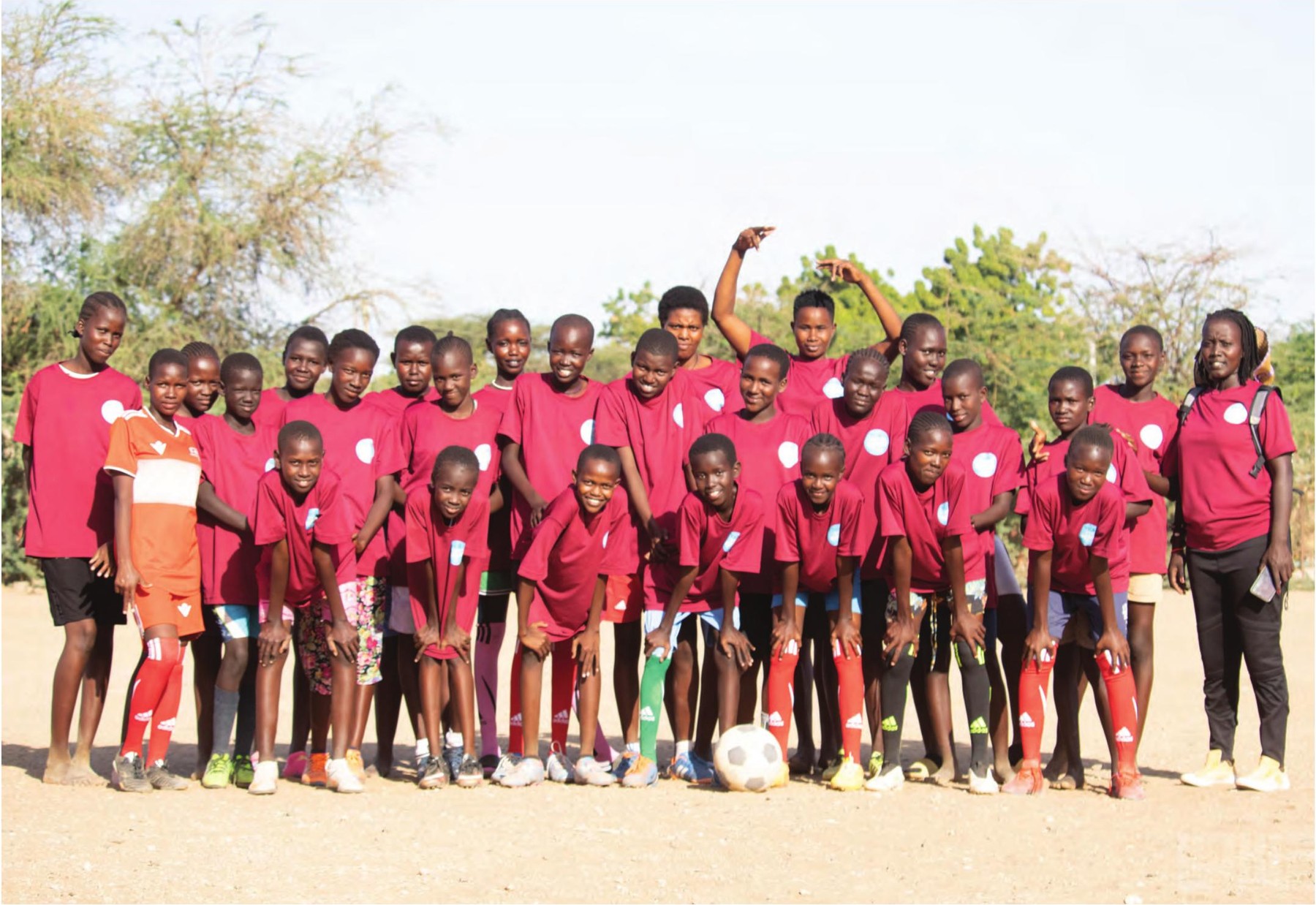 The Desert Roses team standing together in Turkana